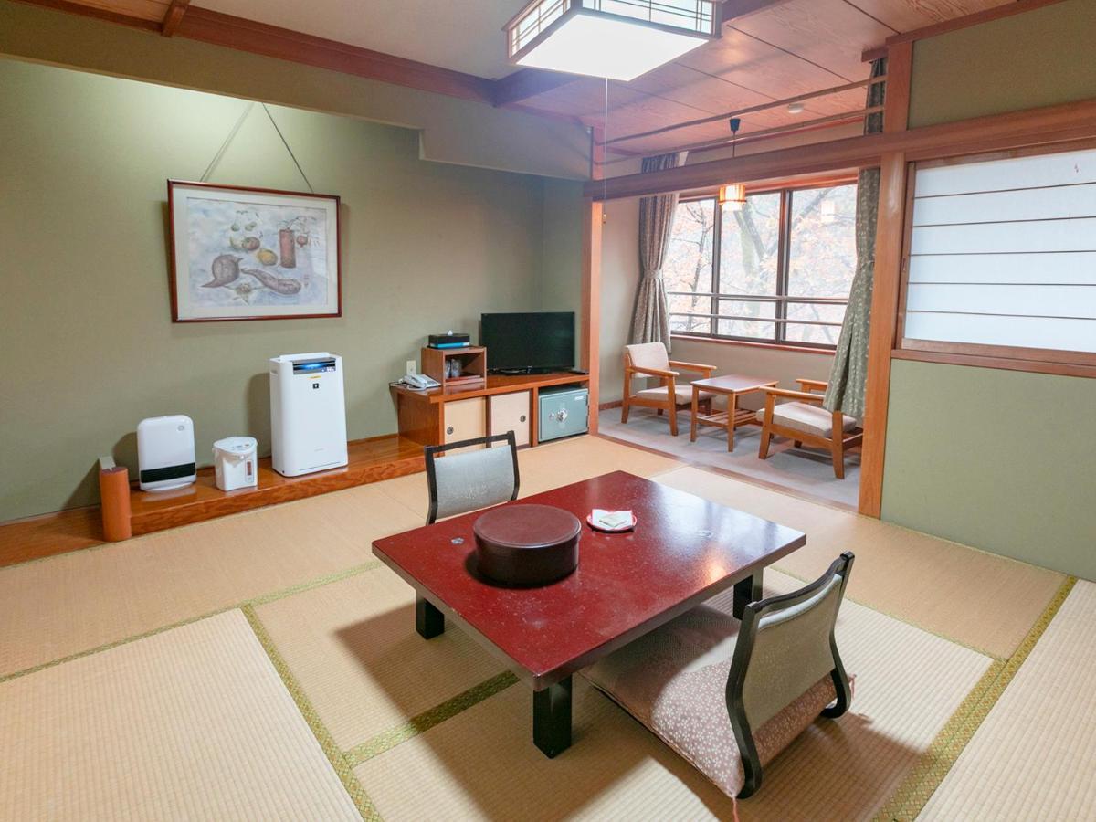 Kagami Hotel Shimojomura Bagian luar foto