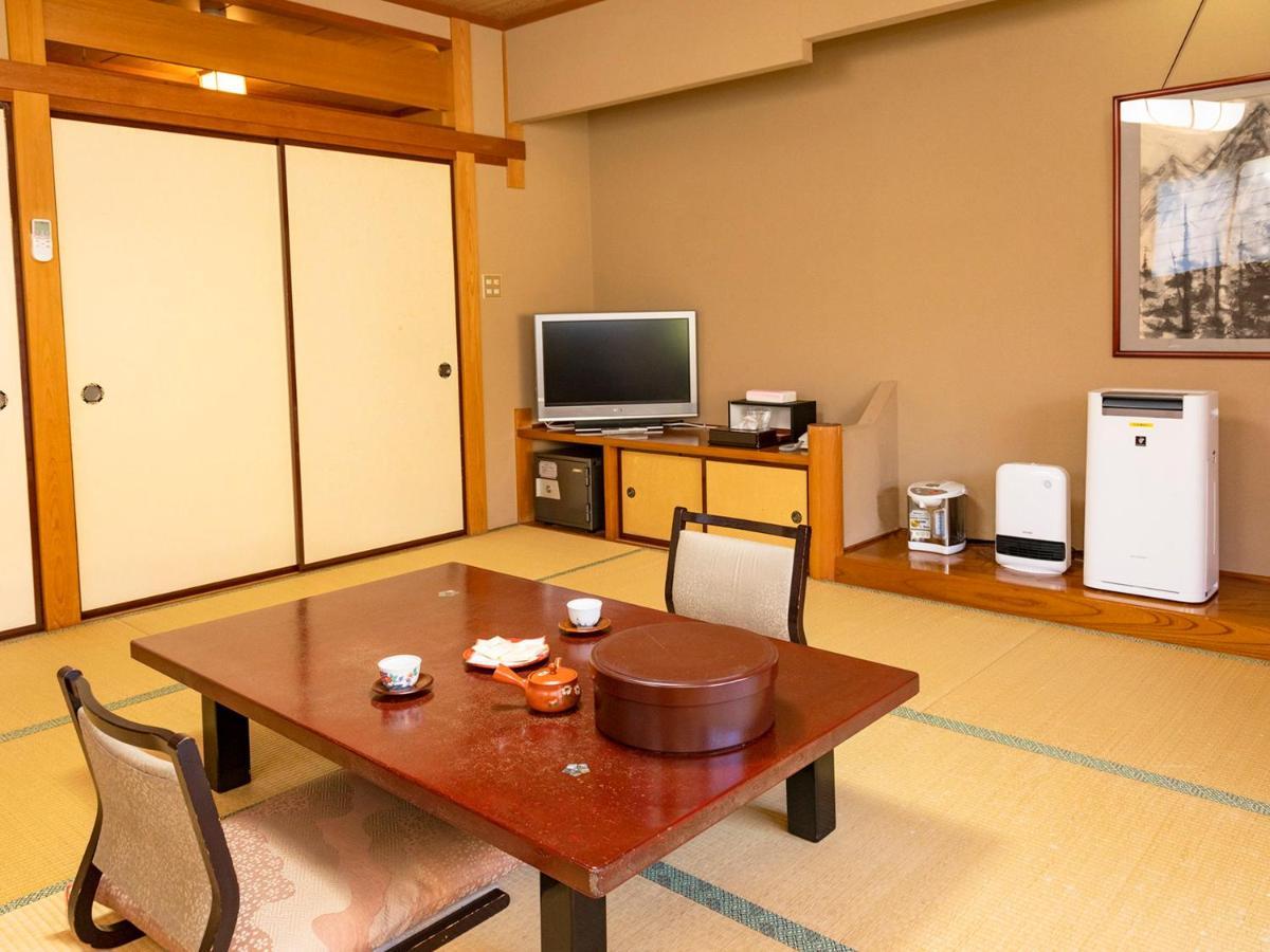 Kagami Hotel Shimojomura Bagian luar foto